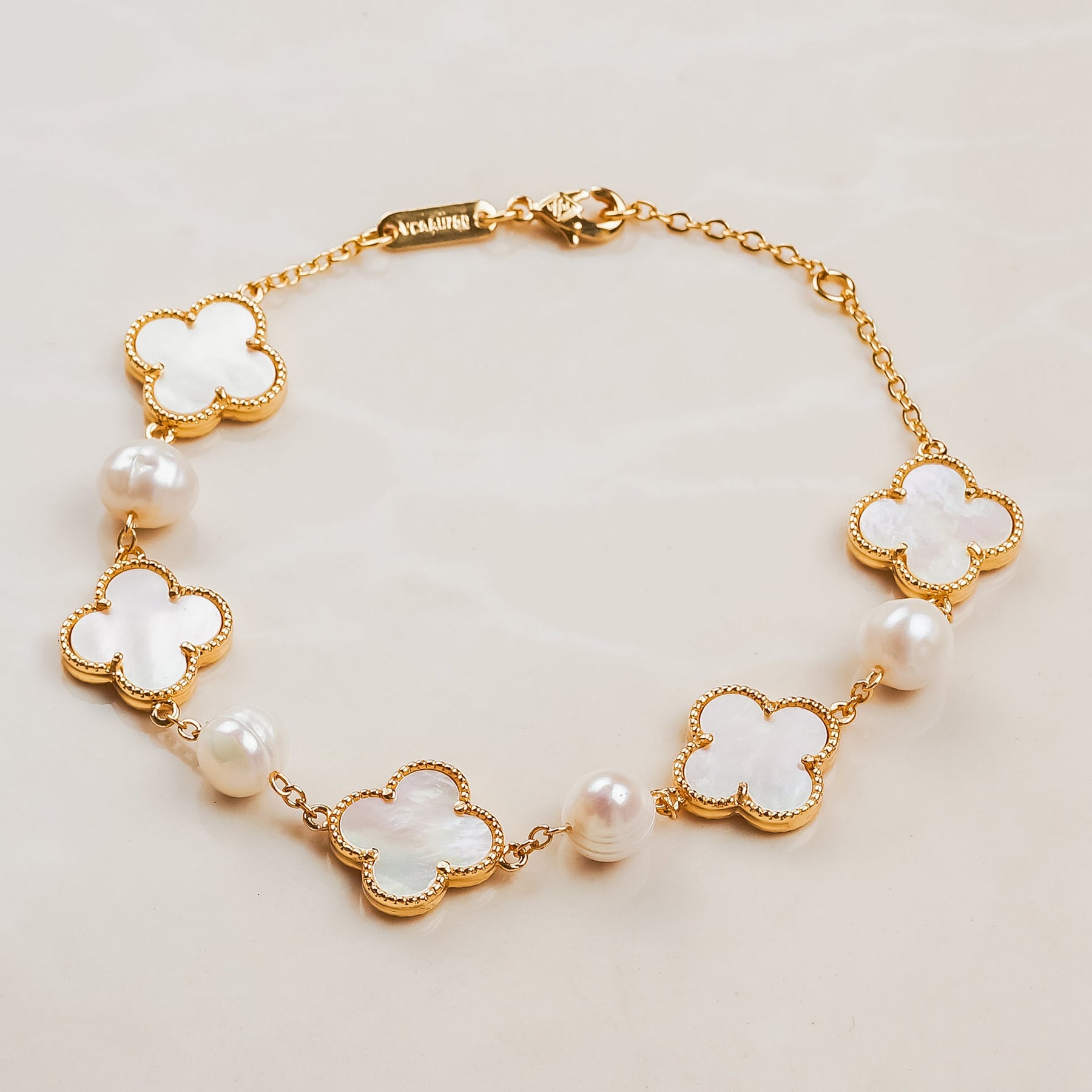 Van Cleef & Arpels 5 Motif Vintage Alhambra Mother of Pearl White Gold –  Dandelion Antiques
